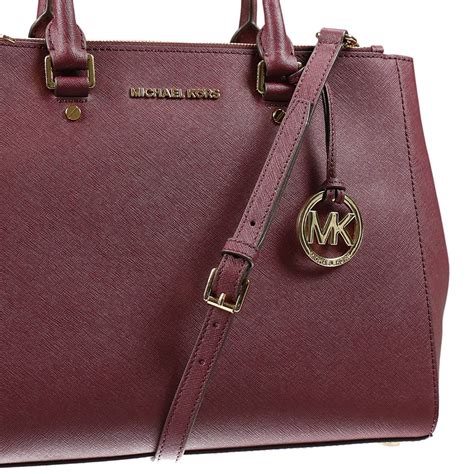 bolso pequeno michael kors vino tinto|Michael Kors bolso negro.